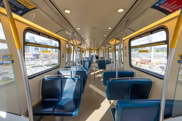 Vancouver, BC, Canada - MAR 29 2021 : Interior of the Millennium Line SkyTrain carriage. The rapid transit system in the Metro Vancouver region of British Columbia. — Stock Photo, Image