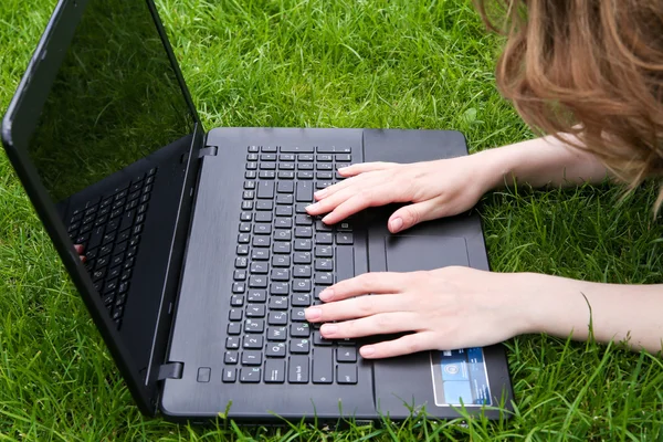 Young Caucasian woman using Laptop Stock Picture