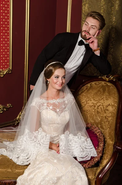 Newlyweds in a luxurious interior — Stock Photo, Image