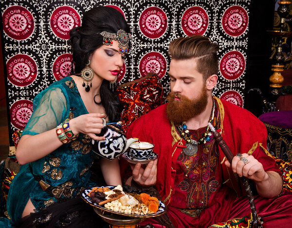 Couple in oriental costumes