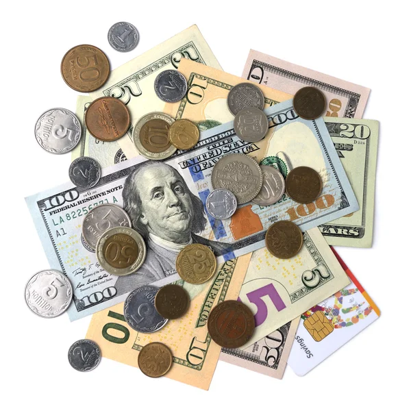 Halom dollár számlák és -érmék elszigetelt fehér background — Stock Fotó