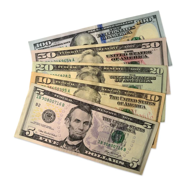 เงินดอลลาร์กองแยกกันบนพื้นหลังสีขาว — ภาพถ่ายสต็อก