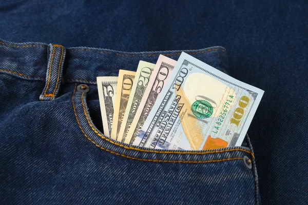 Dollar Bills in the pocket of jeans — Stock Photo, Image