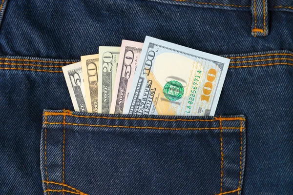 Dollar Bills in the pocket of jeans — Stock Photo, Image