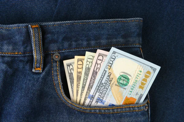 Dollar Bills in the pocket of jeans — Stock Photo, Image
