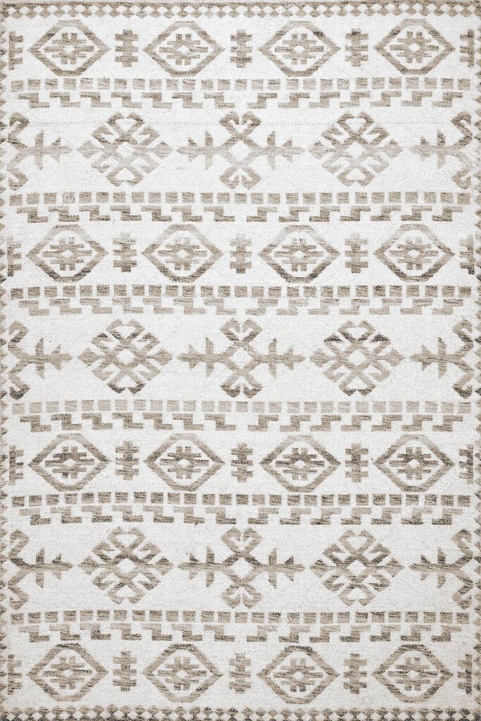 Carpet bathmat and Rug Boho style ethnic design pattern with distressed woven texture and effect