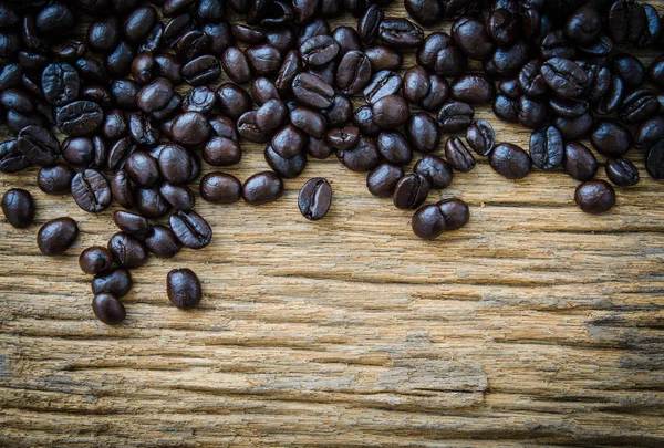 Coffee on grunge wooden background — Stock Photo, Image