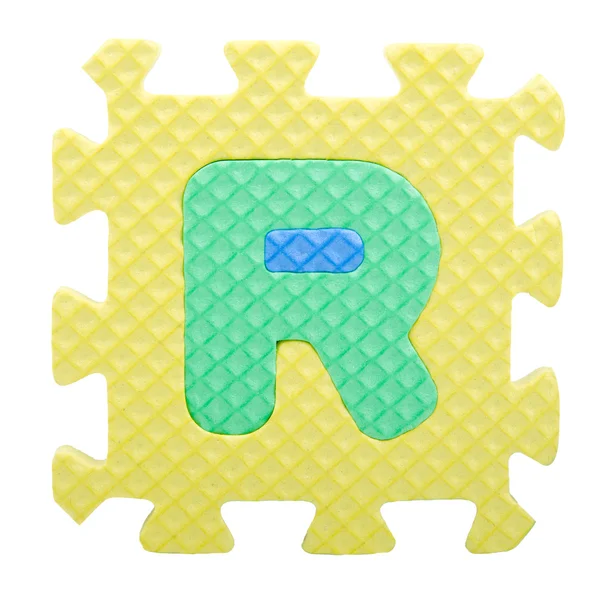 Alfabeto pezzi puzzle su sfondo bianco — Foto Stock