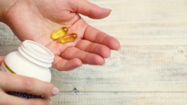 Omega 3 vitaminleri elimizde. seçici odak