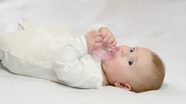 Baby Holding Teether Selective Focus — Stock Photo, Image