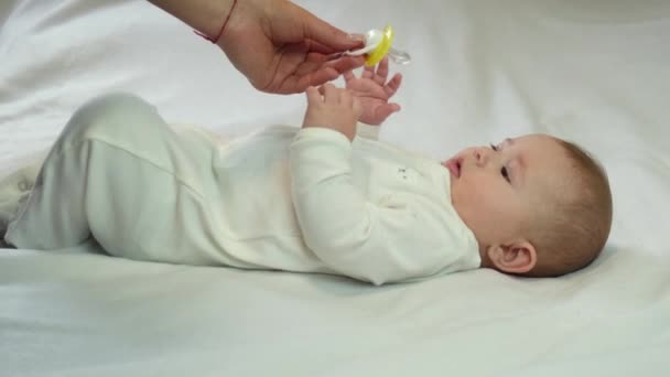 Baby Mother Gives Dummy Selective Focus — Stock Video © tetenio