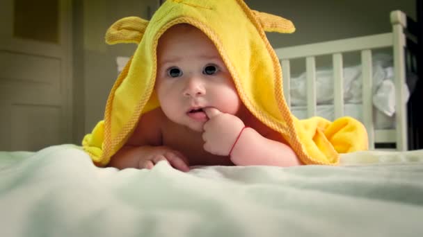 Baby after bathing in a towel. Selective focus. — Stock Video