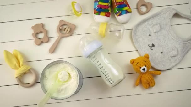 Baby accessories and milk food. Selective focus. — Stock Video