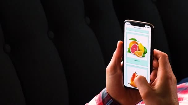 Online order by phone vegetables and fruits. selective focus. — Stock Video