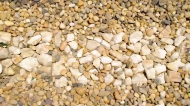 Güzel, pürüzsüz taşların dokusu. Seçici odak.