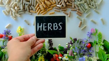 Various medicinal herbs and flowers and supplements. Selective focus. nature.