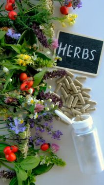 Various medicinal herbs and flowers and supplements. Selective focus. nature.