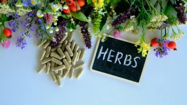 Various medicinal herbs and flowers and supplements. Selective focus. nature.