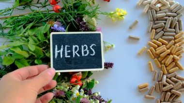 Various medicinal herbs and flowers and supplements. Selective focus. nature.