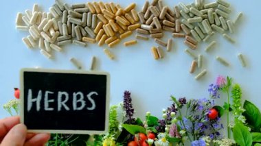 Various medicinal herbs and flowers and supplements. Selective focus. nature.