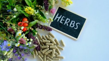 Various medicinal herbs and flowers and supplements. Selective focus. nature.