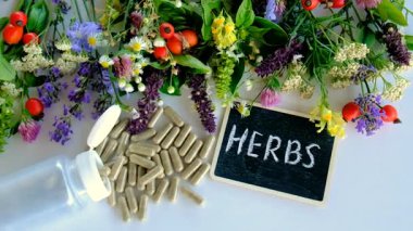 Various medicinal herbs and flowers and supplements. Selective focus. nature.
