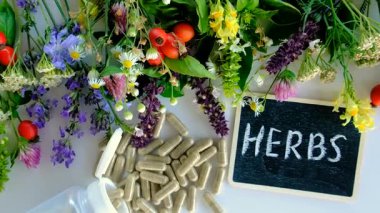 Various medicinal herbs and flowers and supplements. Selective focus. nature.