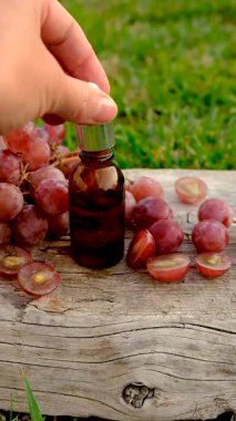 Grape seed extract in the garden. Selective focus. nature.