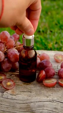 Grape seed extract in the garden. Selective focus. nature.