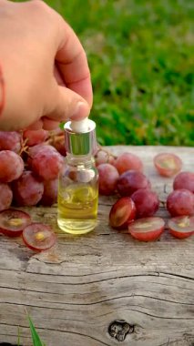 Grape seed extract in the garden. Selective focus. nature.