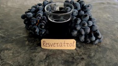 Resveratrol supplements and homeopathy. Selective focus. food.