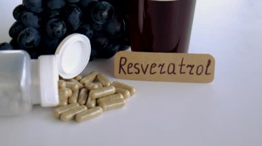 Resveratrol supplements and homeopathy. Selective focus. food.