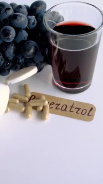 Resveratrol supplements and homeopathy. Selective focus. food.