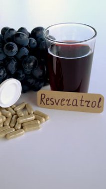 Resveratrol supplements and homeopathy. Selective focus. food.