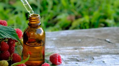 Raspberry leaf extract and supplements. Selective focus. Food.