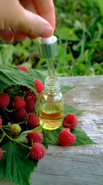 Raspberry leaf extract and supplements. Selective focus. Food.