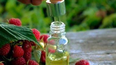 Raspberry leaf extract and supplements. Selective focus. Food.