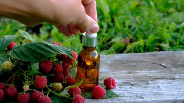 Raspberry leaf extract and supplements. Selective focus. Food.