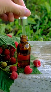 Raspberry leaf extract and supplements. Selective focus. Food.