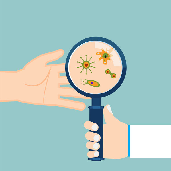 Magnifier and bacteria on human palm