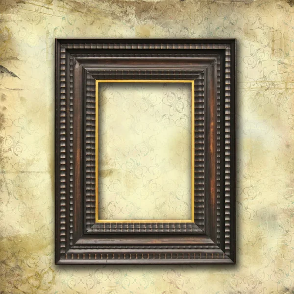 Art-deco wooden frame on grunge floral wallpaper — Stock Photo, Image