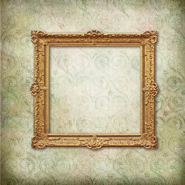 Gold baroque empty frame on Victorian wallpaper — Stock Photo, Image