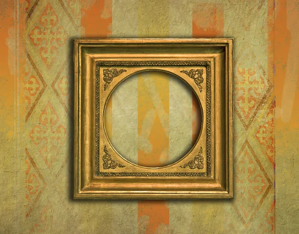 กรอบสีทองวินเทจบนพื้นหลังกรังจ์ — ภาพถ่ายสต็อก