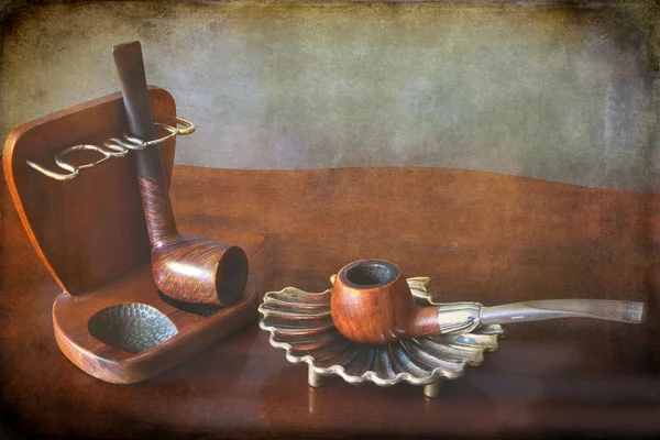 Two vintage tobacco pipes with holder — Stock Photo, Image