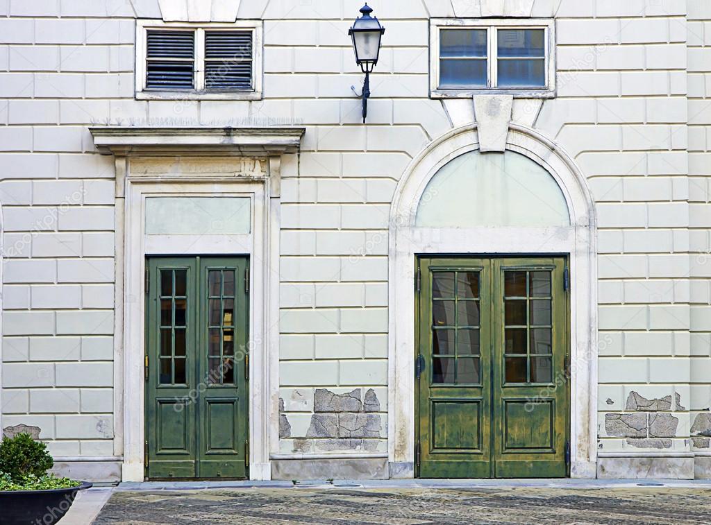 Vintage facade with two green wooden door