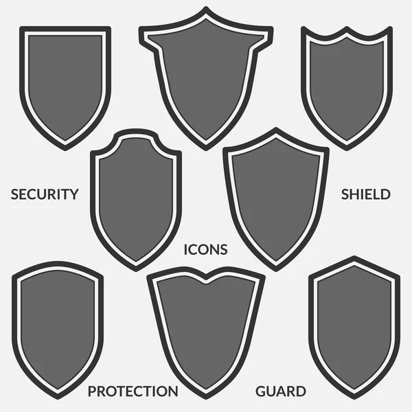 Set of shield icons. Monochrome security signs isolated on white background.