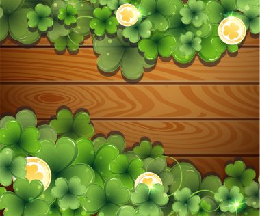 Sikke ve yonca ahşap arka plan üzerinde