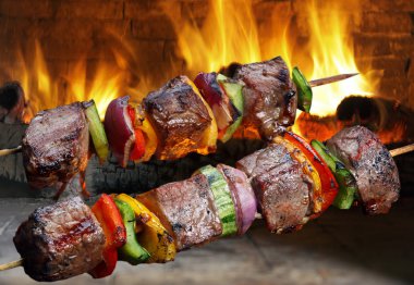 Delicious Kebabs with vegetables clipart