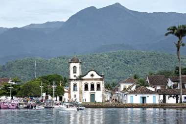 Old buildings with mountains on background