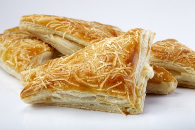 Puffs with sauce and cheese